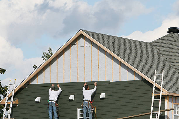 Professional Siding technician working in Bremen, OH